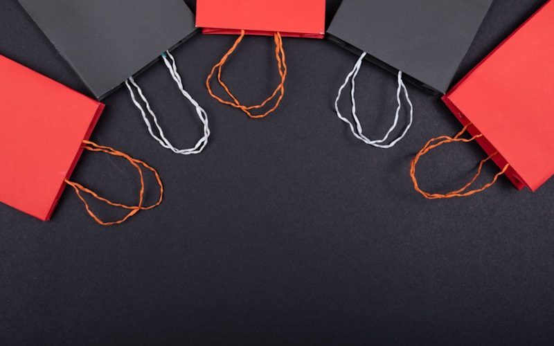 Online and in-store commerce setup with laptop and packages