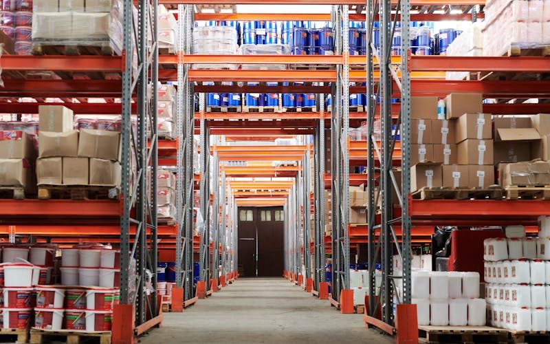 Busy 3PL warehouse interior with shelving and activity
